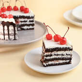 Sliced view of Cherry Topped Black Forest Cake